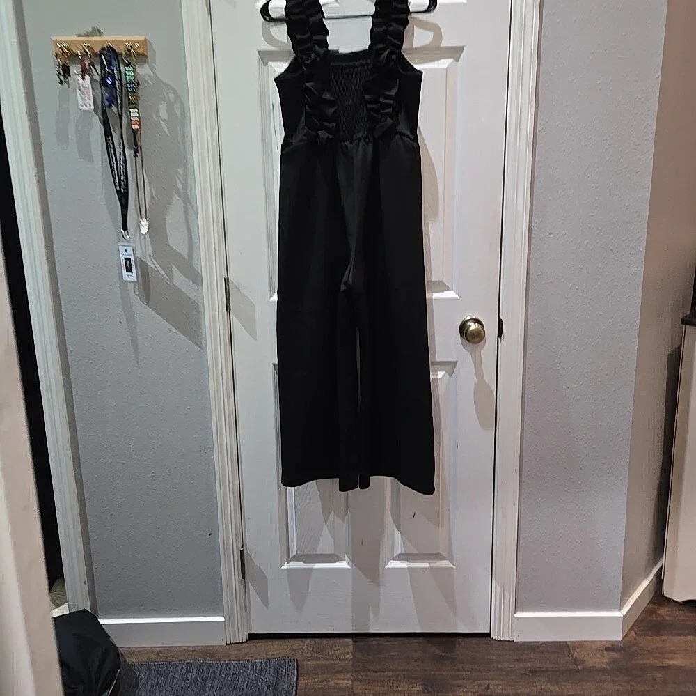 Girls Black Ruffle-Strap Romper with Bow